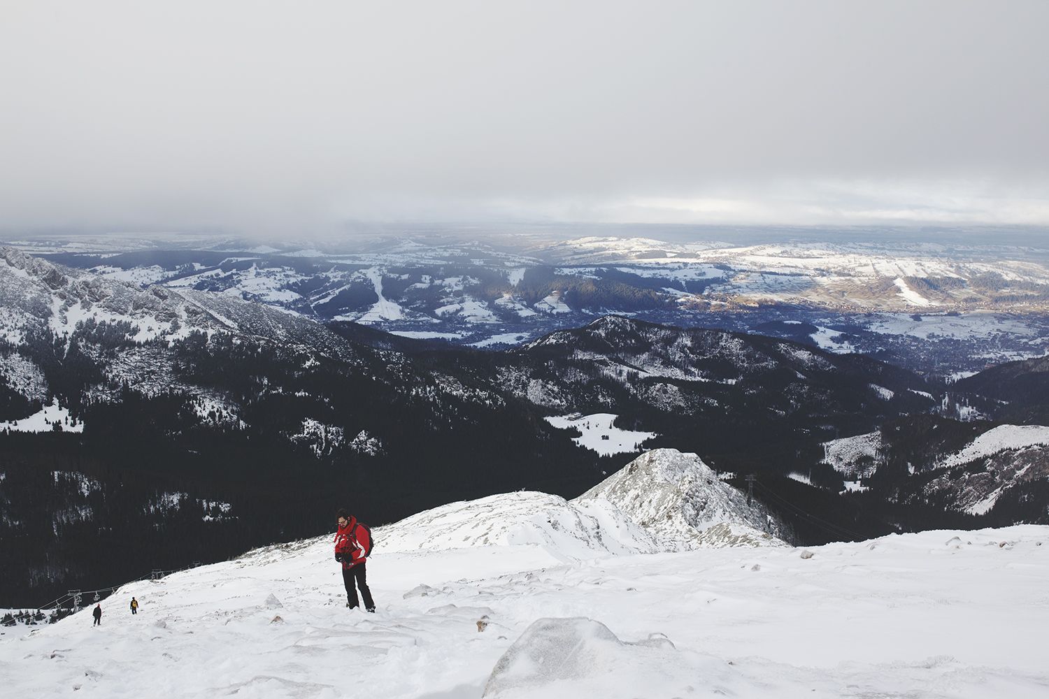Hikers Climbing Down The Mountain