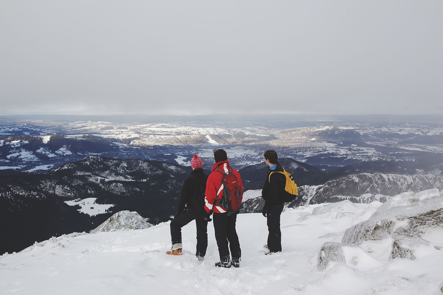 Hikers Climbing Down The Mountain