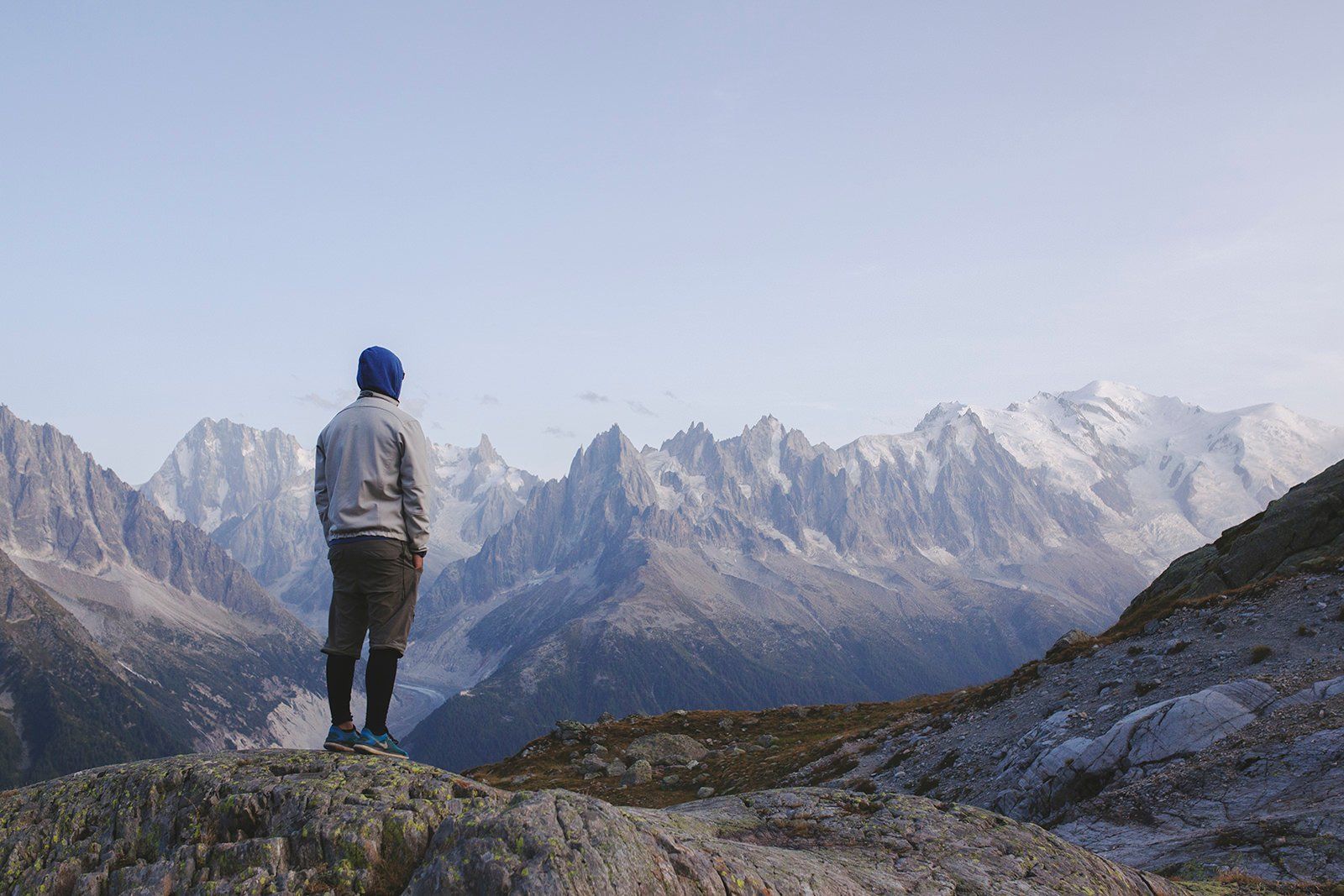 A man standing and watching at Mont Blanc