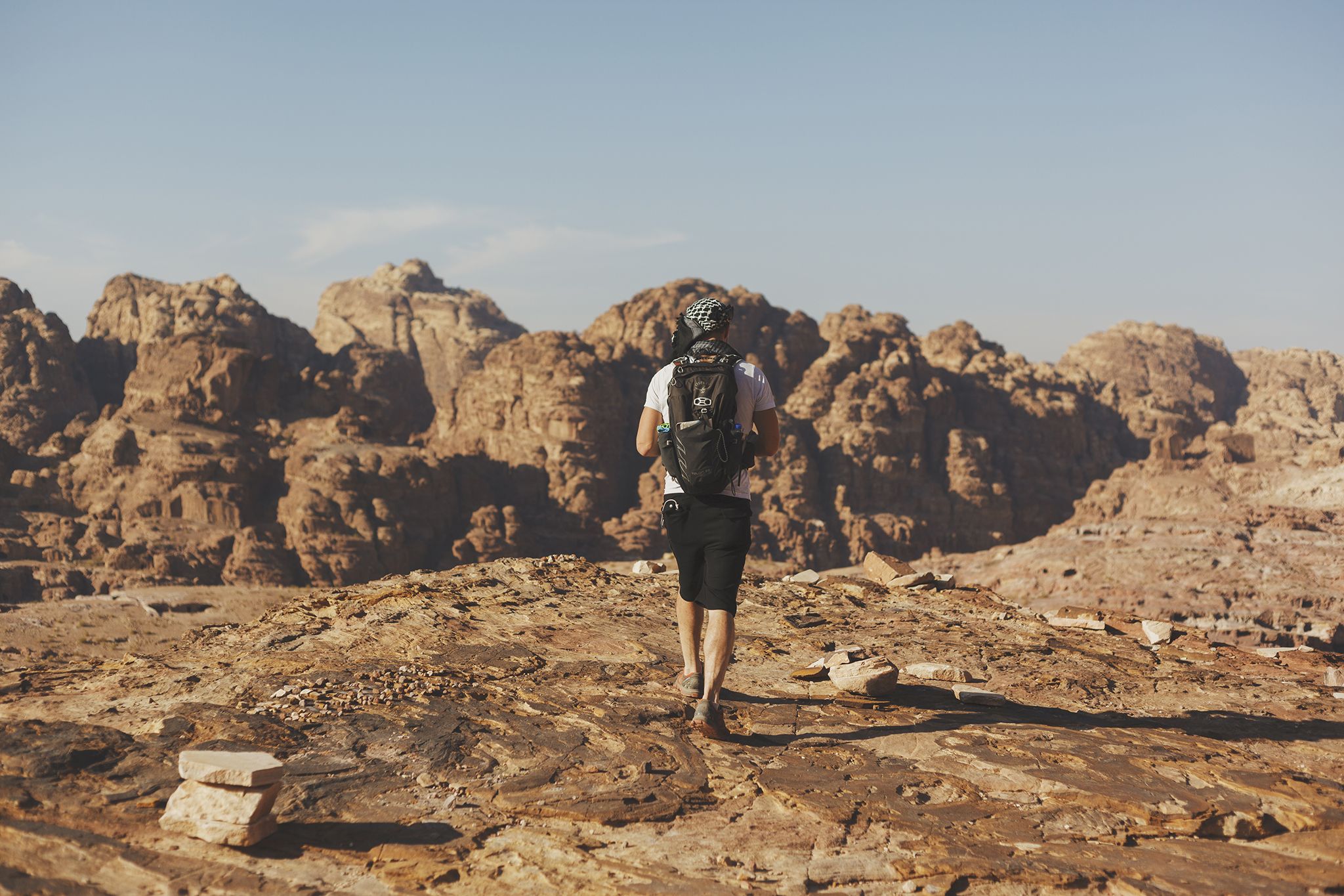 A Man Walking To A Cliff