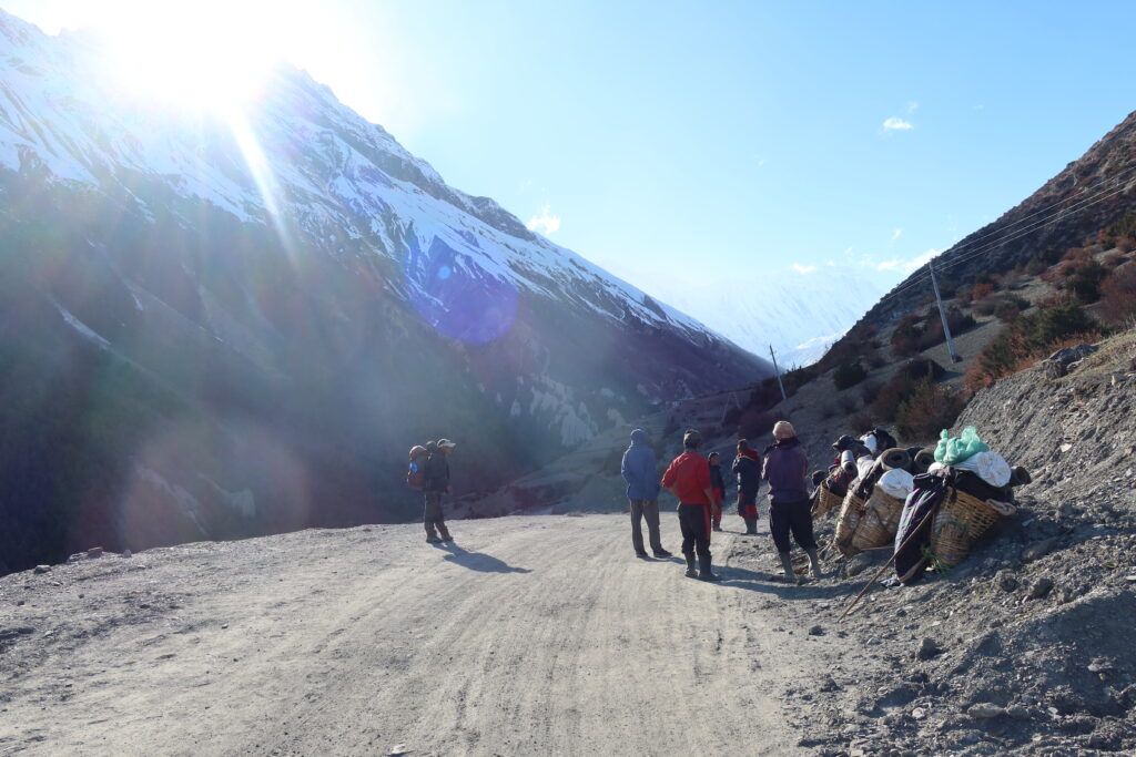 Sherpas carrying equipment up the mountain